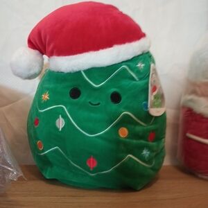 Festive Green Plush with Santa Hat